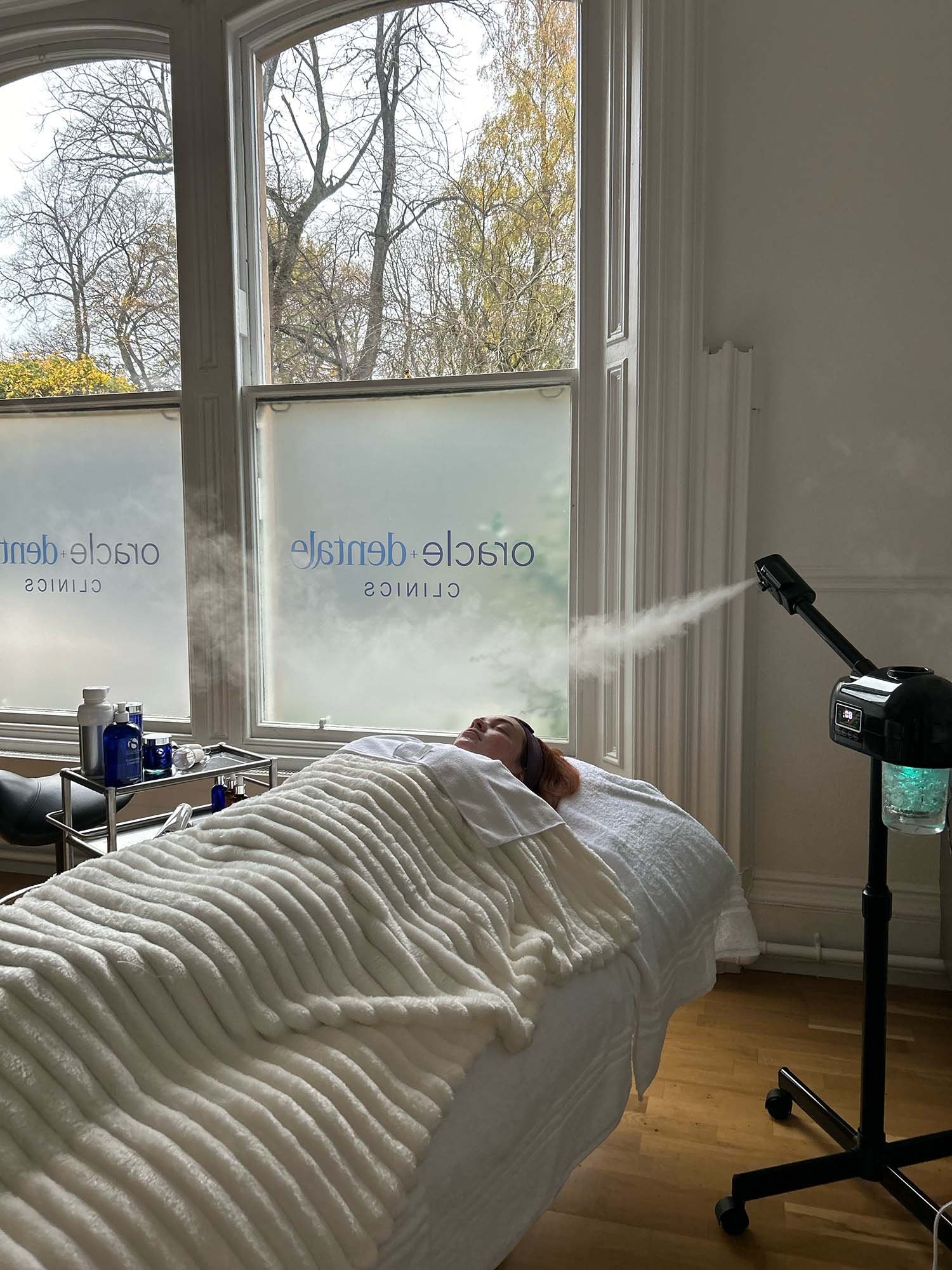 woman getting face steamed