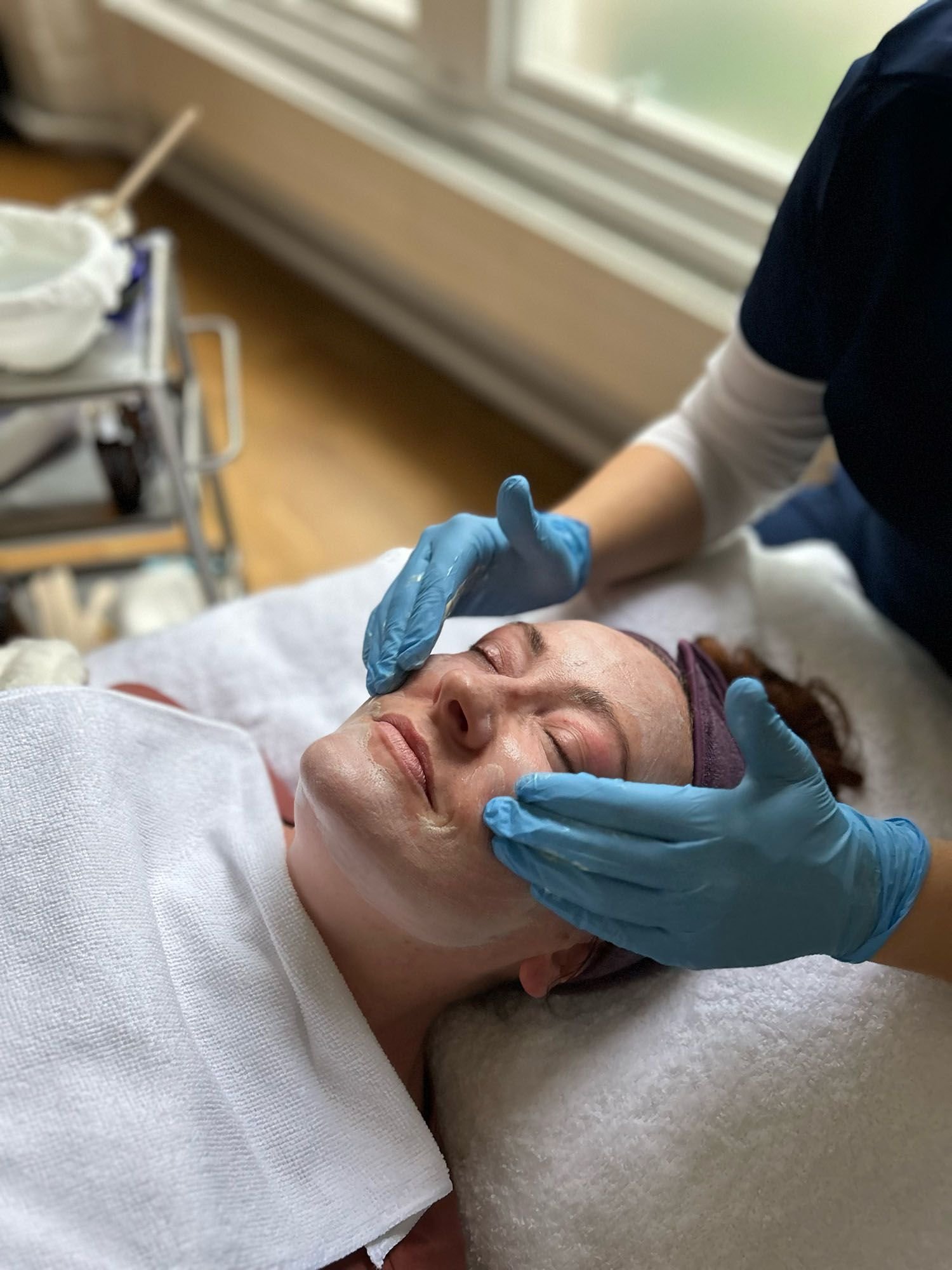 woman getting facial treatment