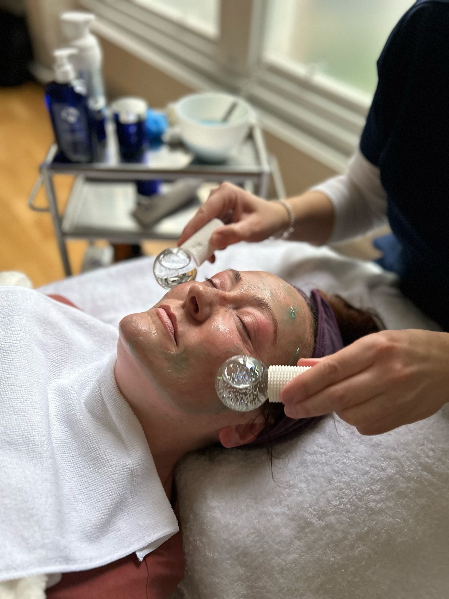 woman getting treatment rolled into skin
