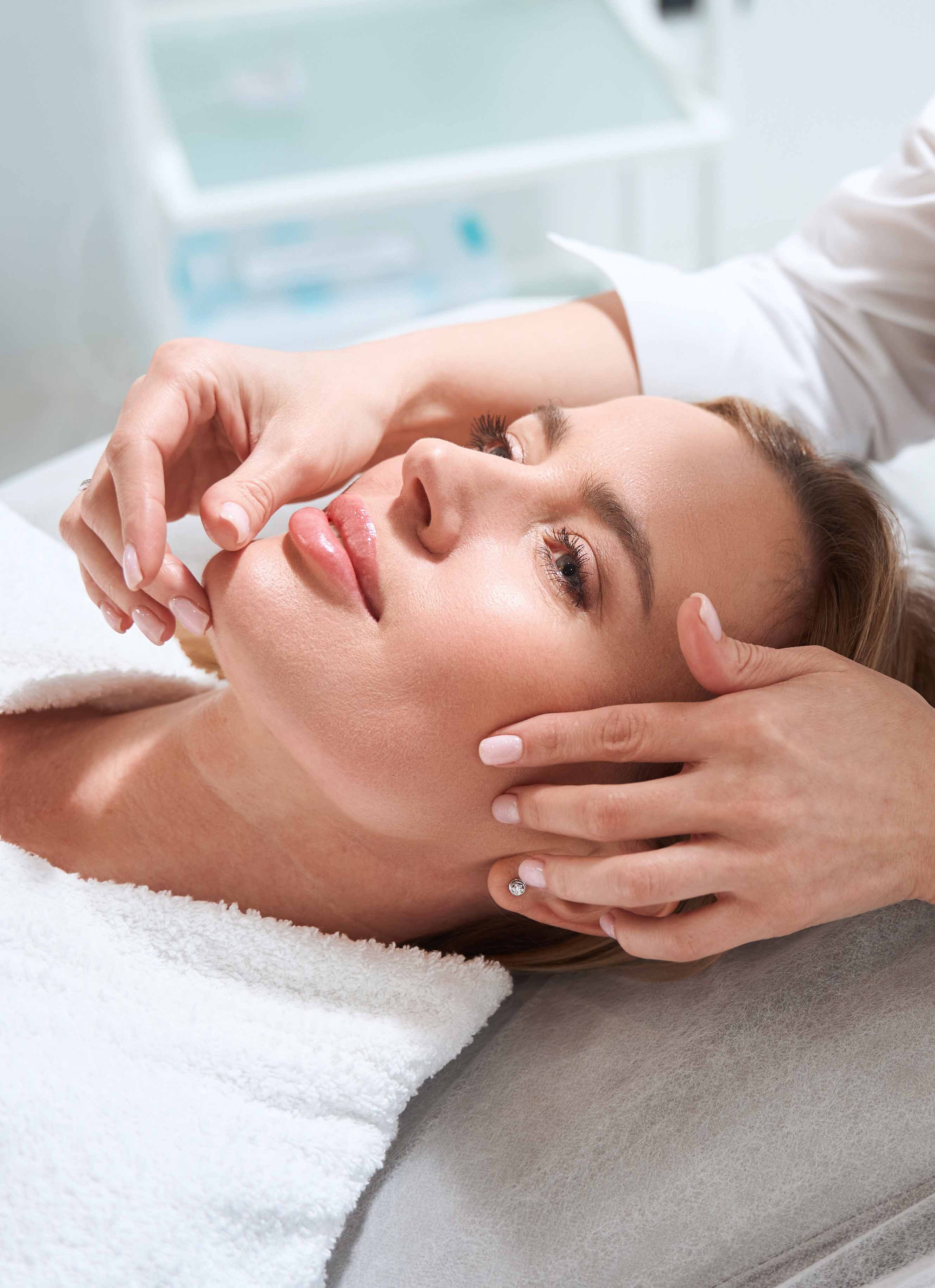 touching patient face